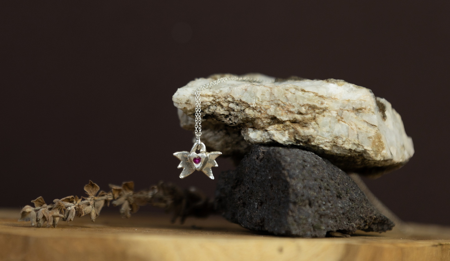 Silver heart with wings necklace